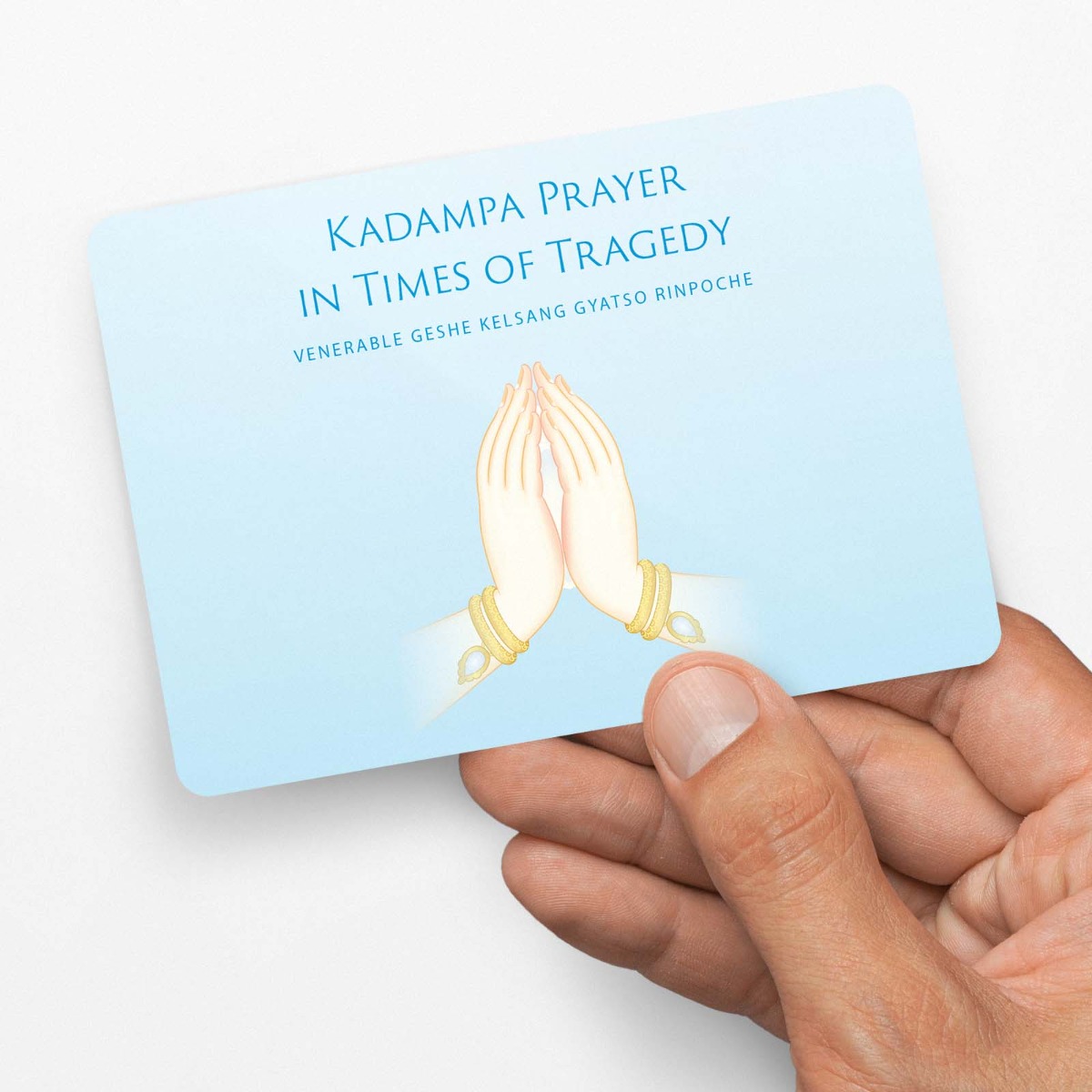 Kadampa-Prayer-Tragedy_3D-Passport-Card-Front-Held_2022-05